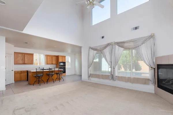 a dining room with furniture and window