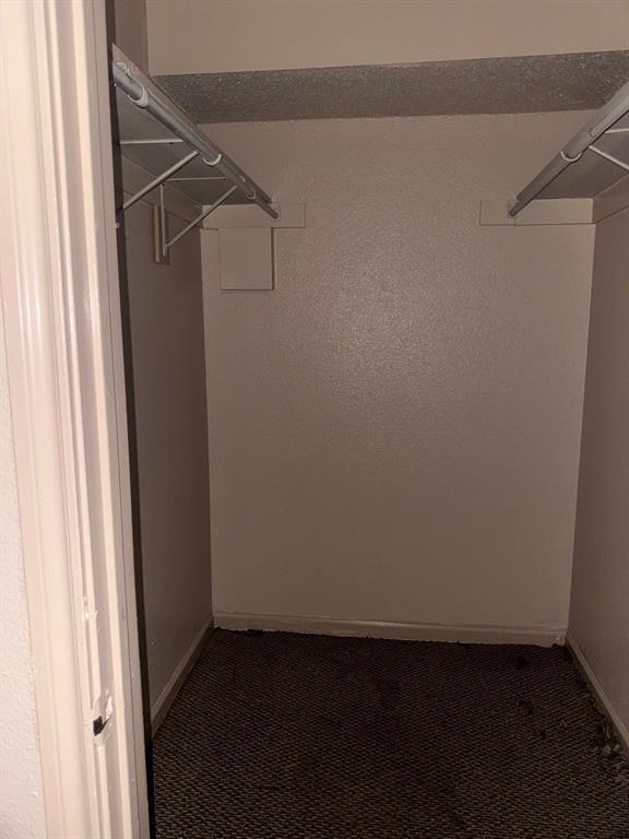 6108 Abrams Road, Unit 103 Dallas, TX 75231 - Photo 11 of 17 a view of an empty walk in closet