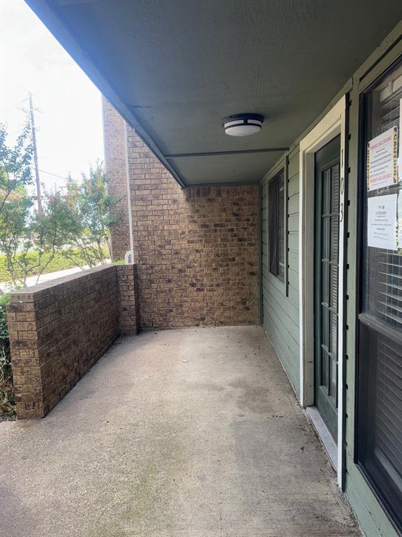 6108 Abrams Road, Unit 103 Dallas, TX 75231 - Photo 15 of 17 a view of outdoor space and porch