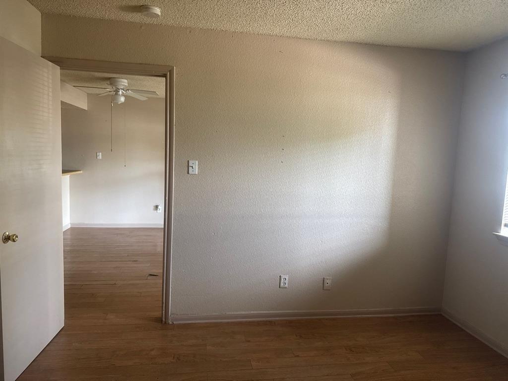 6108 Abrams Road, Unit 103 Dallas, TX 75231 - Photo 9 of 17 an empty room with an empty space