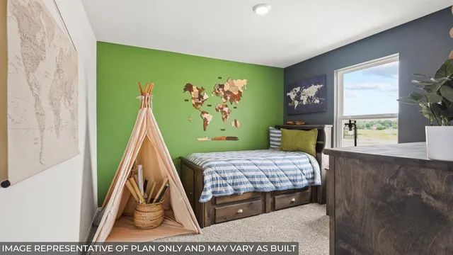 a bedroom with two beds and a large window