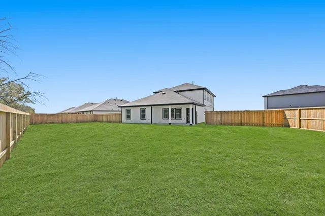 a view of a balcony with chairs
