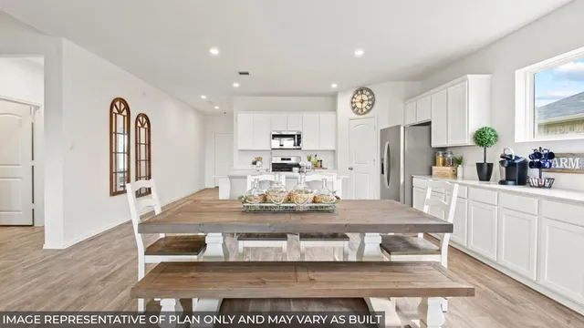 a living room with furniture a table and a clock