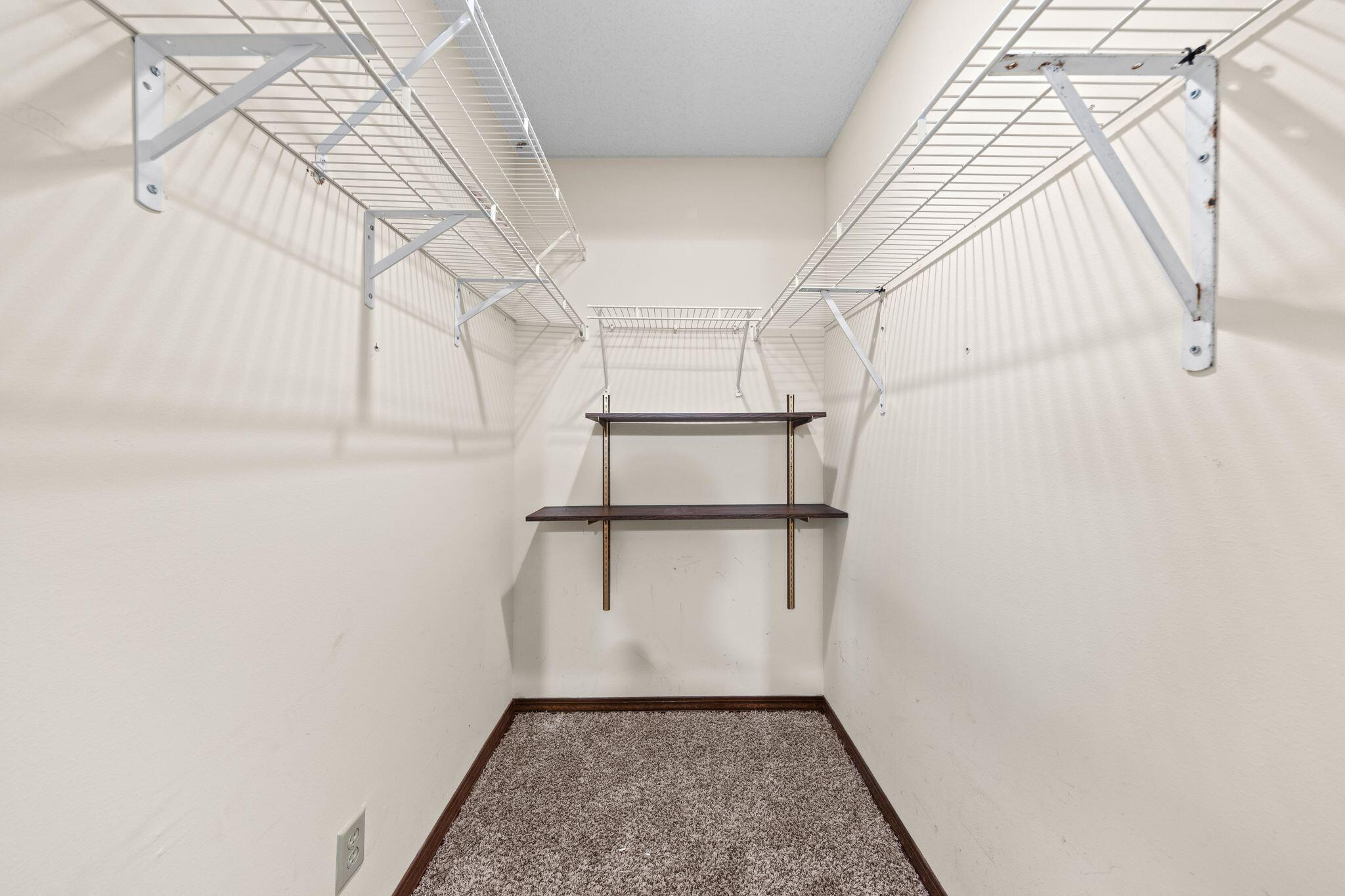 144 Oak Terrace Drive Crestview, FL 32539 - Photo 27 of 61 a view of an empty walk in closet