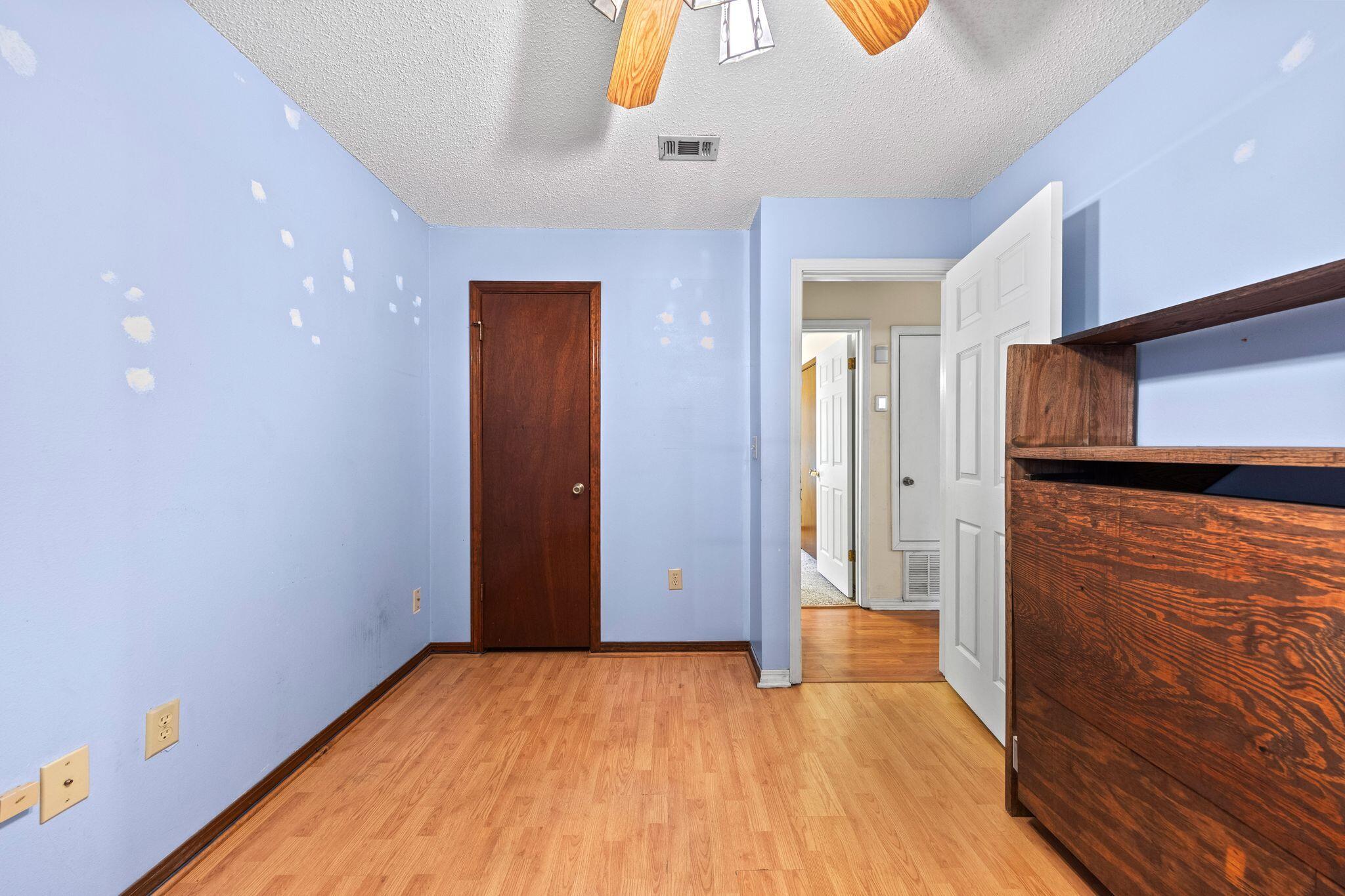144 Oak Terrace Drive Crestview, FL 32539 - Photo 31 of 61 a view of a hallway with wooden floor