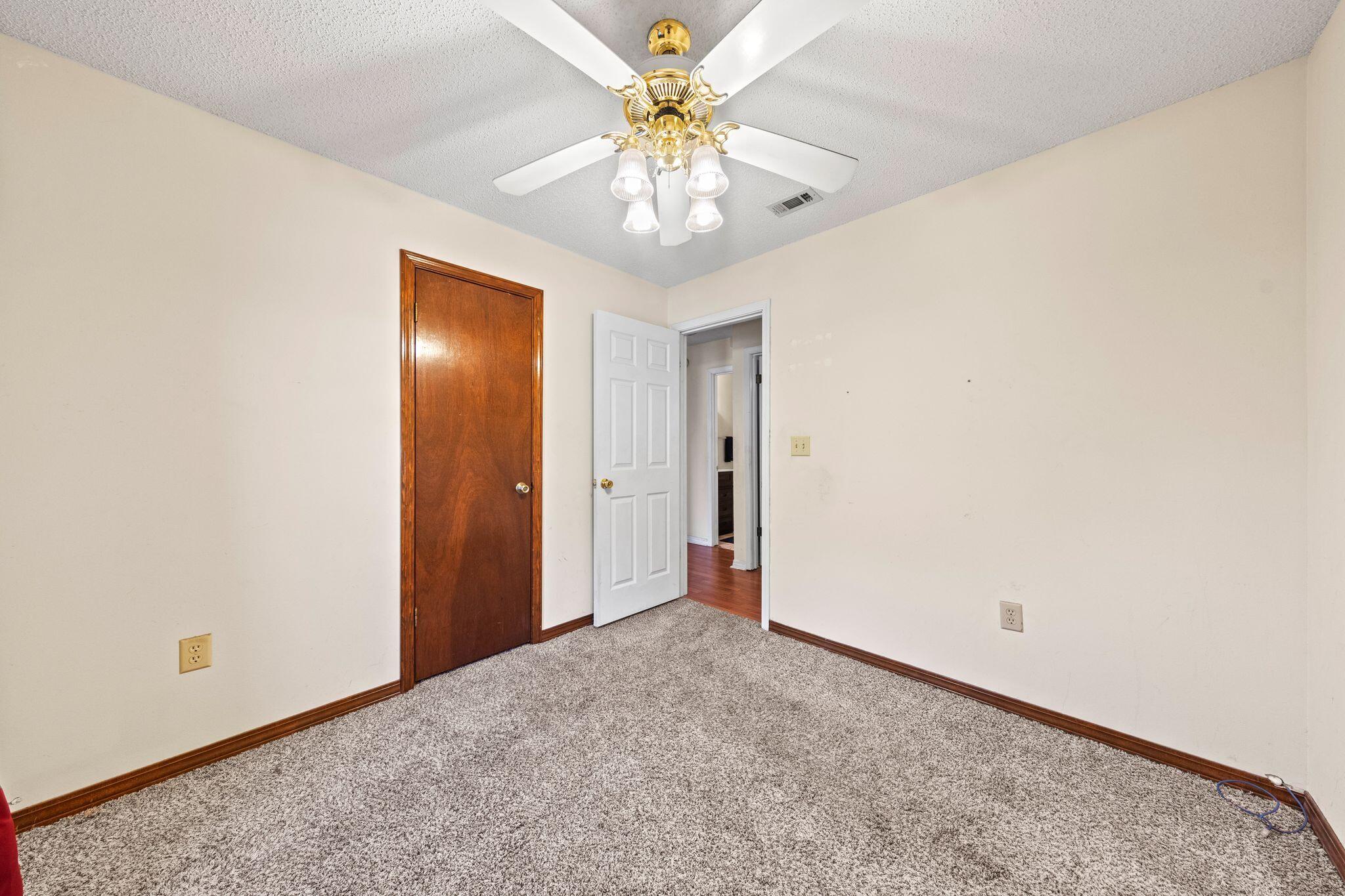 144 Oak Terrace Drive Crestview, FL 32539 - Photo 33 of 61 a view of an empty room and chandelier fan