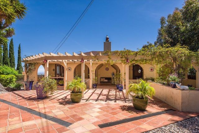a view of a porch with furniture