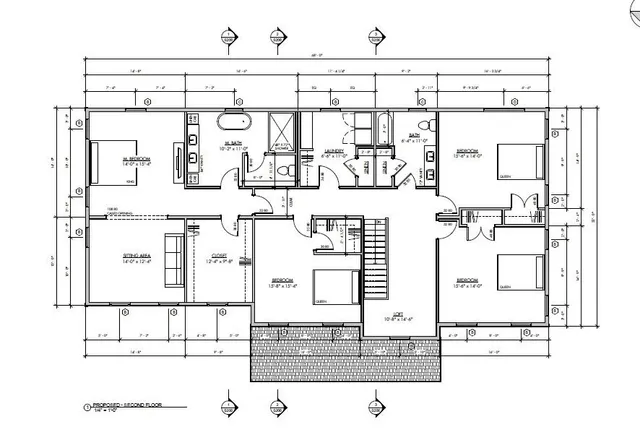 a black and white photo of a living room