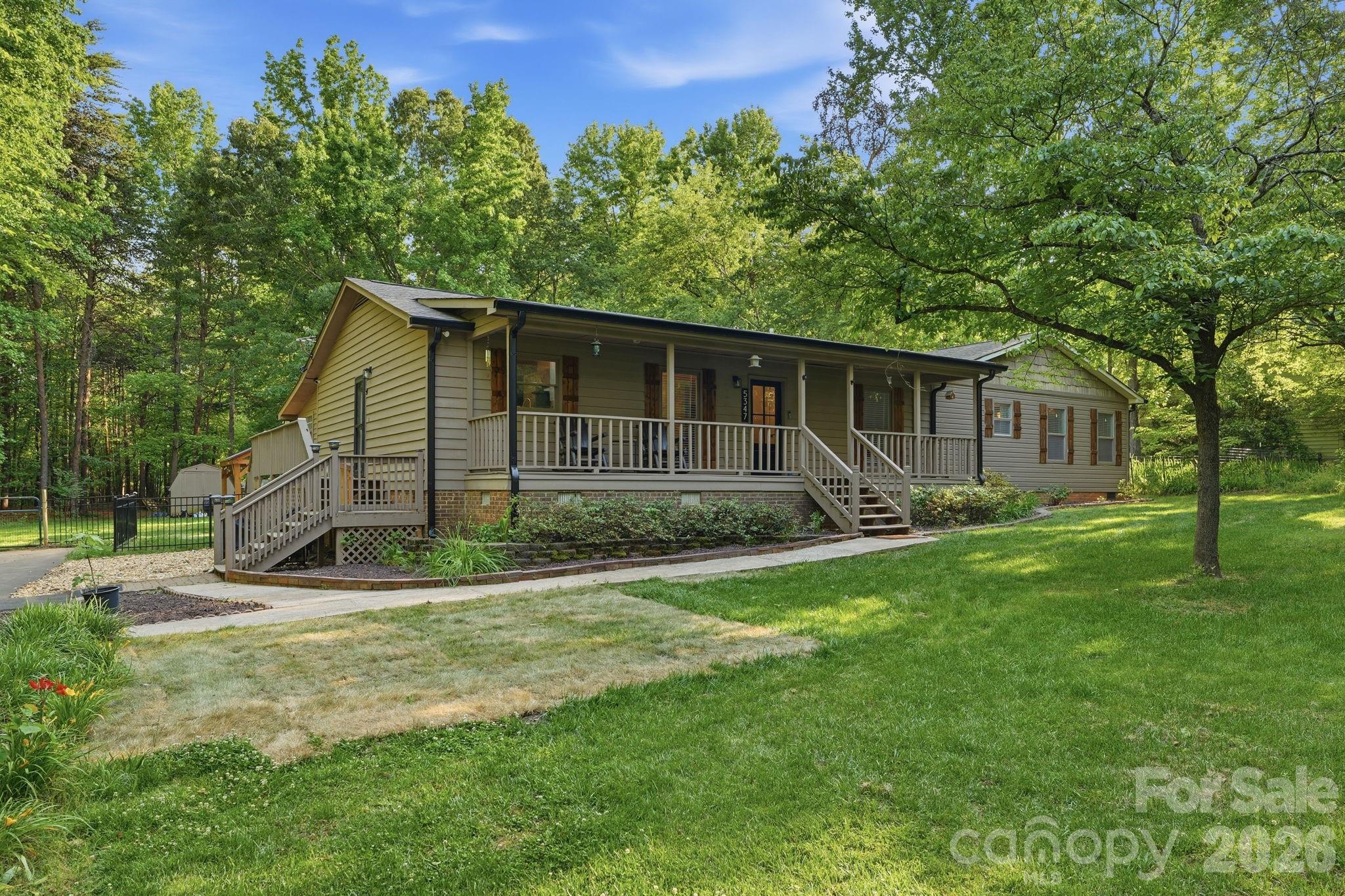 5347 Haney Road York, SC 29745 - Photo 2 of 39 a view of a house with backyard and a tree