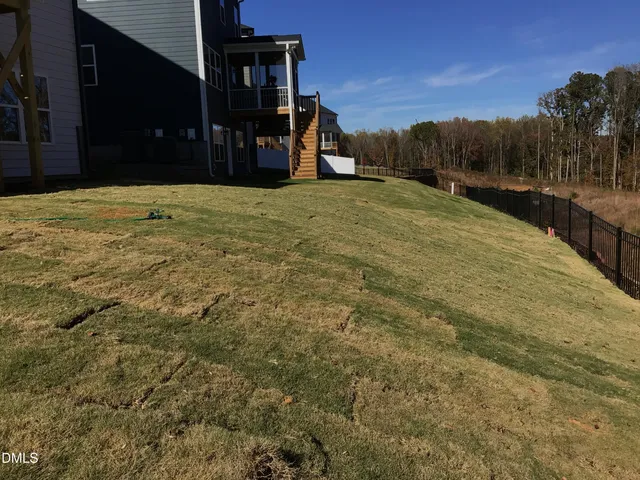 a view of a house with wooden stairs