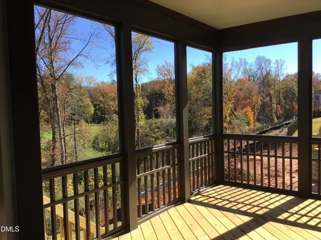 a bathroom with a glass door shower