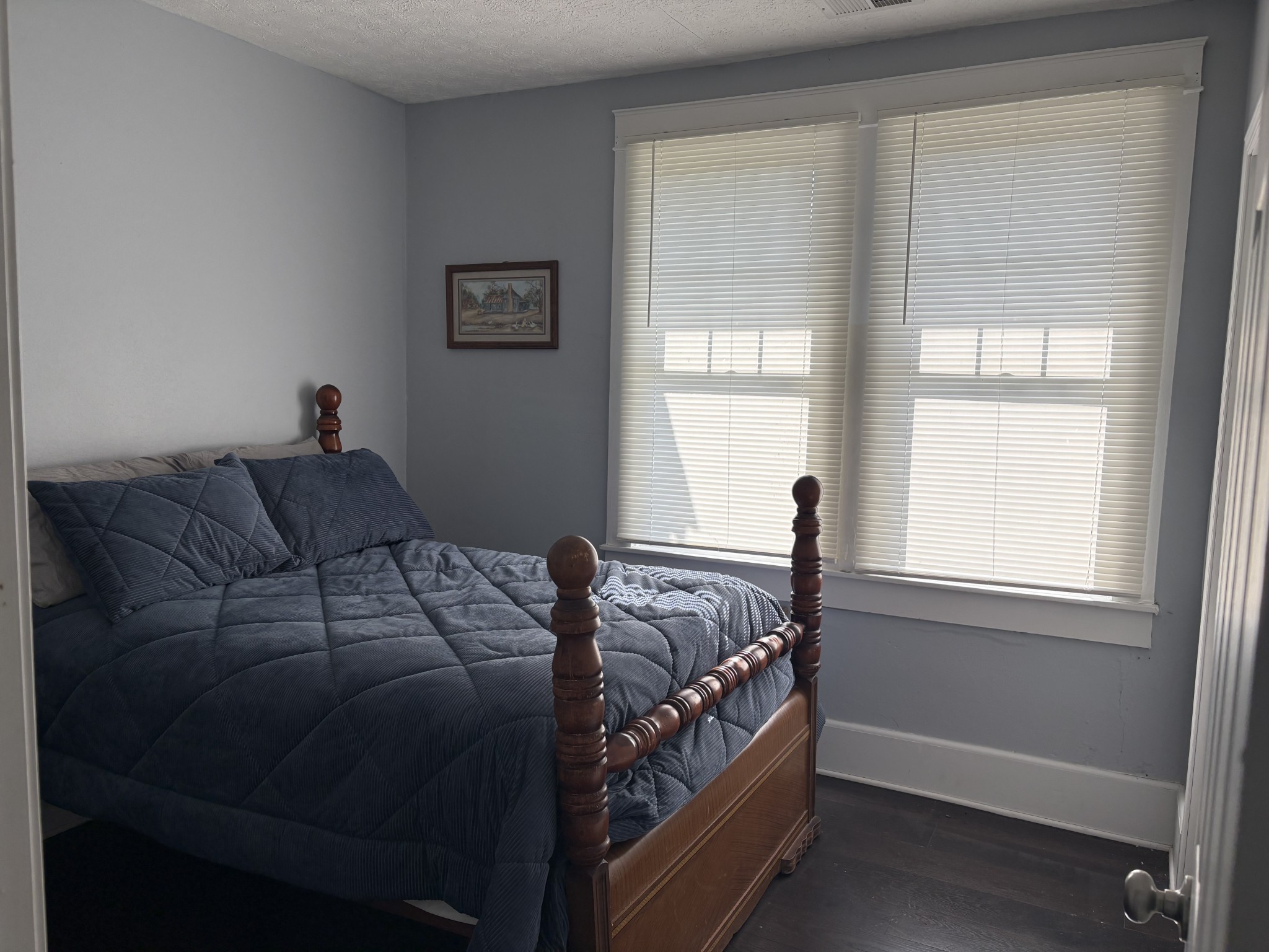 317 East Main Street Waverly, TN 37185 - Photo 5 of 9 a bedroom with a bed and a window