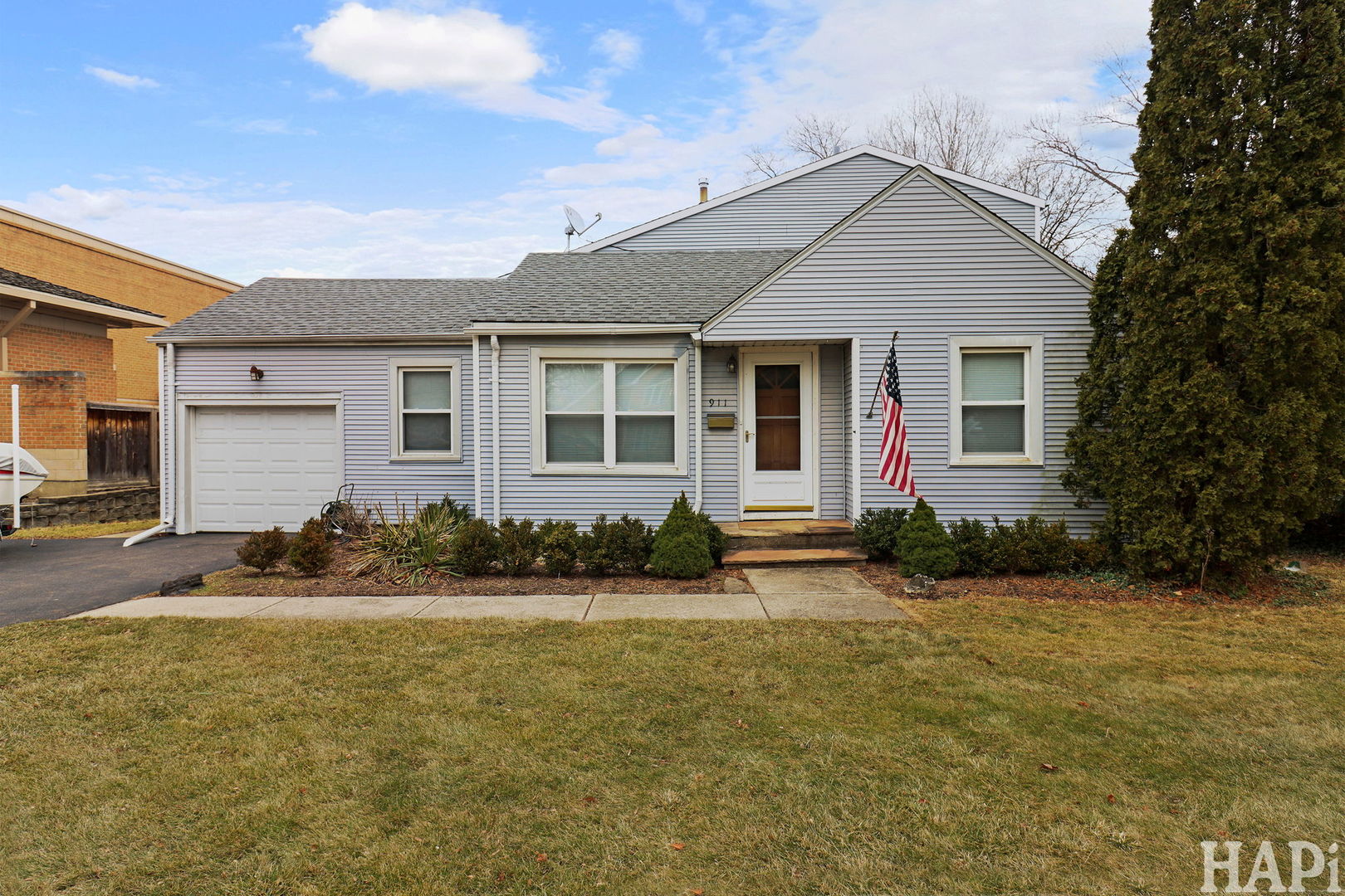 911 Elmdale Road Glenview, IL 60025 - Photo 1 of 1 front view of a house with a yard