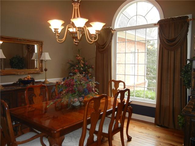 291 Laurel Crown Road Manchester, TN 37355 - Photo 3 of 20 a view of a dining room with furniture window and wooden floor
