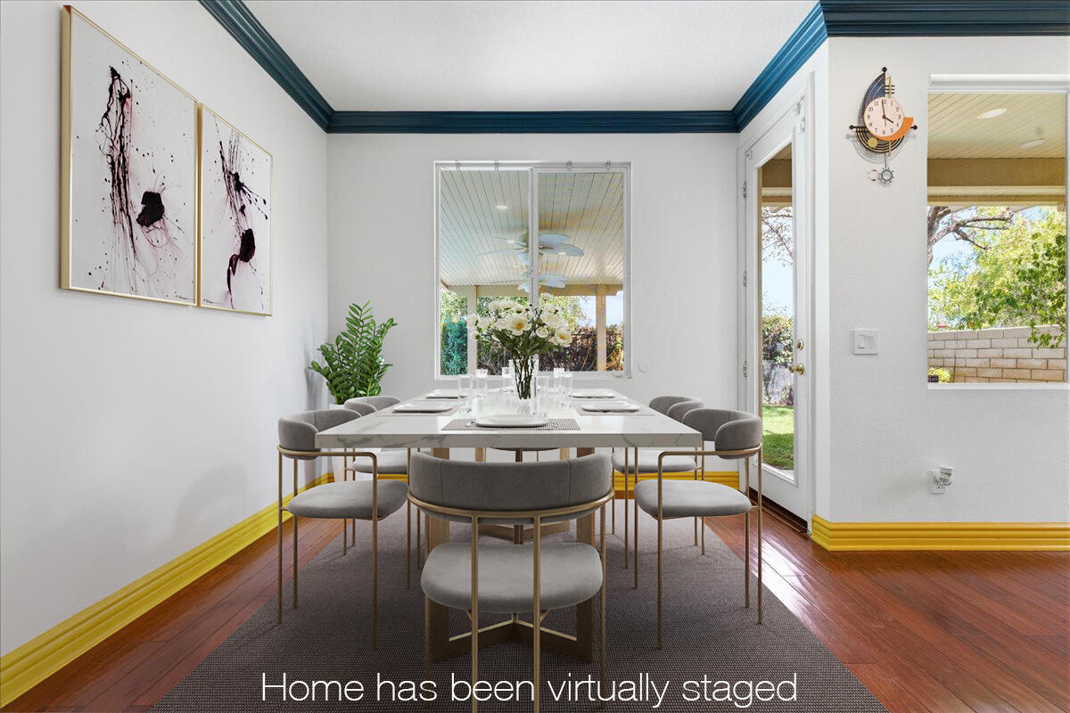 23732 Bella Vista Road Corona, CA 92883 - Photo 14 of 49 a view of a dining room with furniture and wooden floor