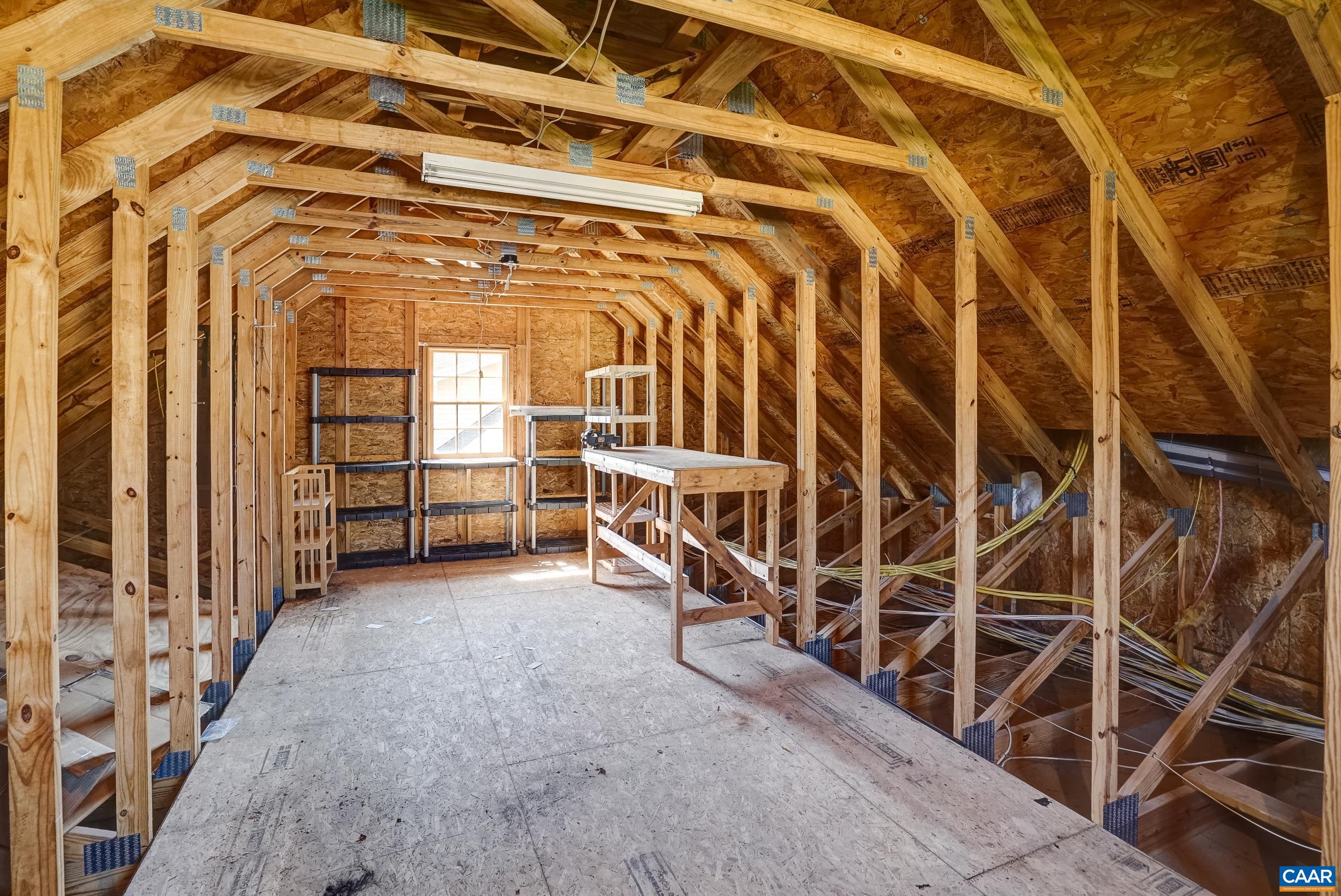 5223 Brook View Road Crozet, VA 22932 - Photo 56 of 63 Walk-up stairs lead to floored attic space above garage.