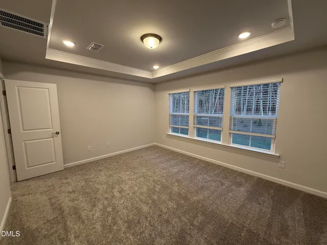 a bathroom with a double vanity sink and mirror