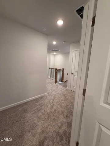 a bathroom with a double vanity sink toilet mirror and shower