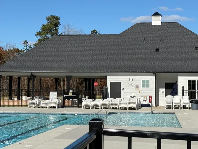 a room with gym equipment and a large window
