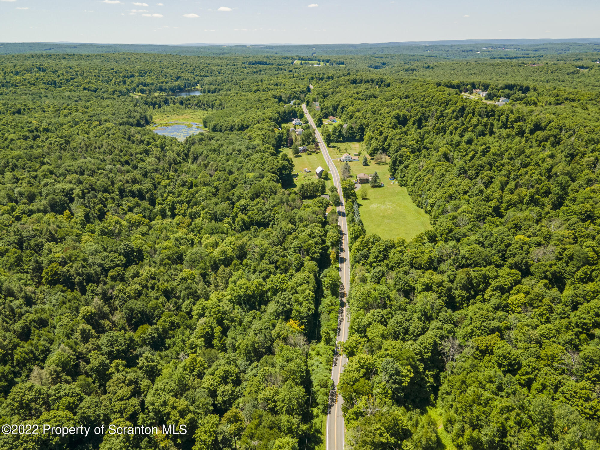 Lot 1 Jubilee Road Moscow, PA 18444 - Photo 3 of 11 a view of a city with lush green forest