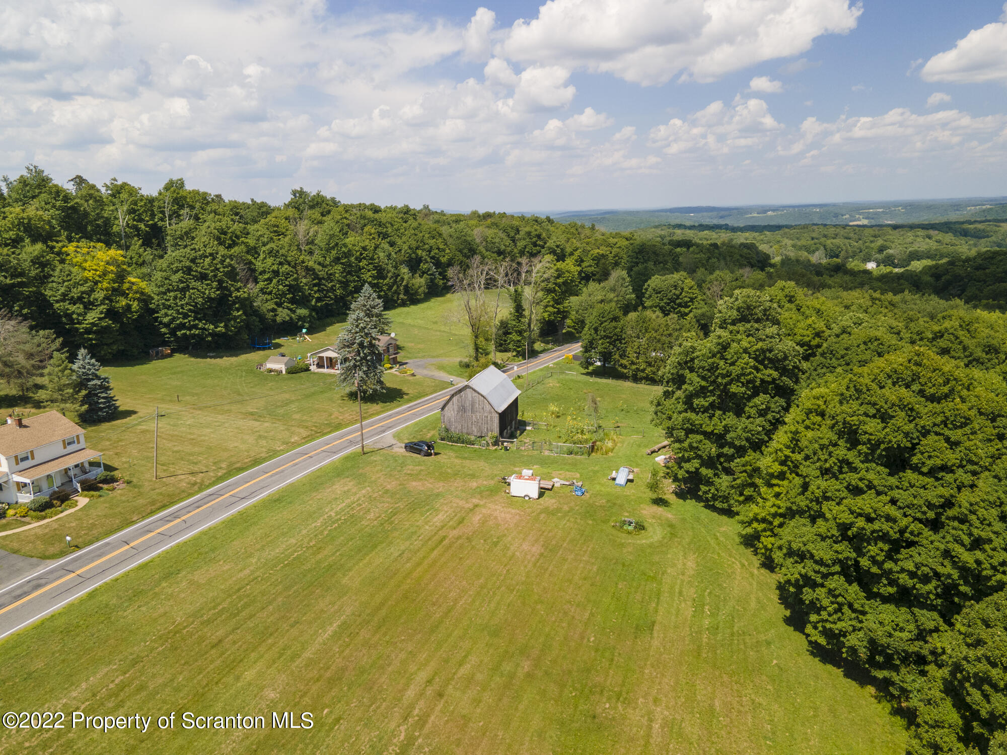 Lot 1 Jubilee Road Moscow, PA 18444 - Photo 7 of 11 a view of an outdoor space and swimming pool