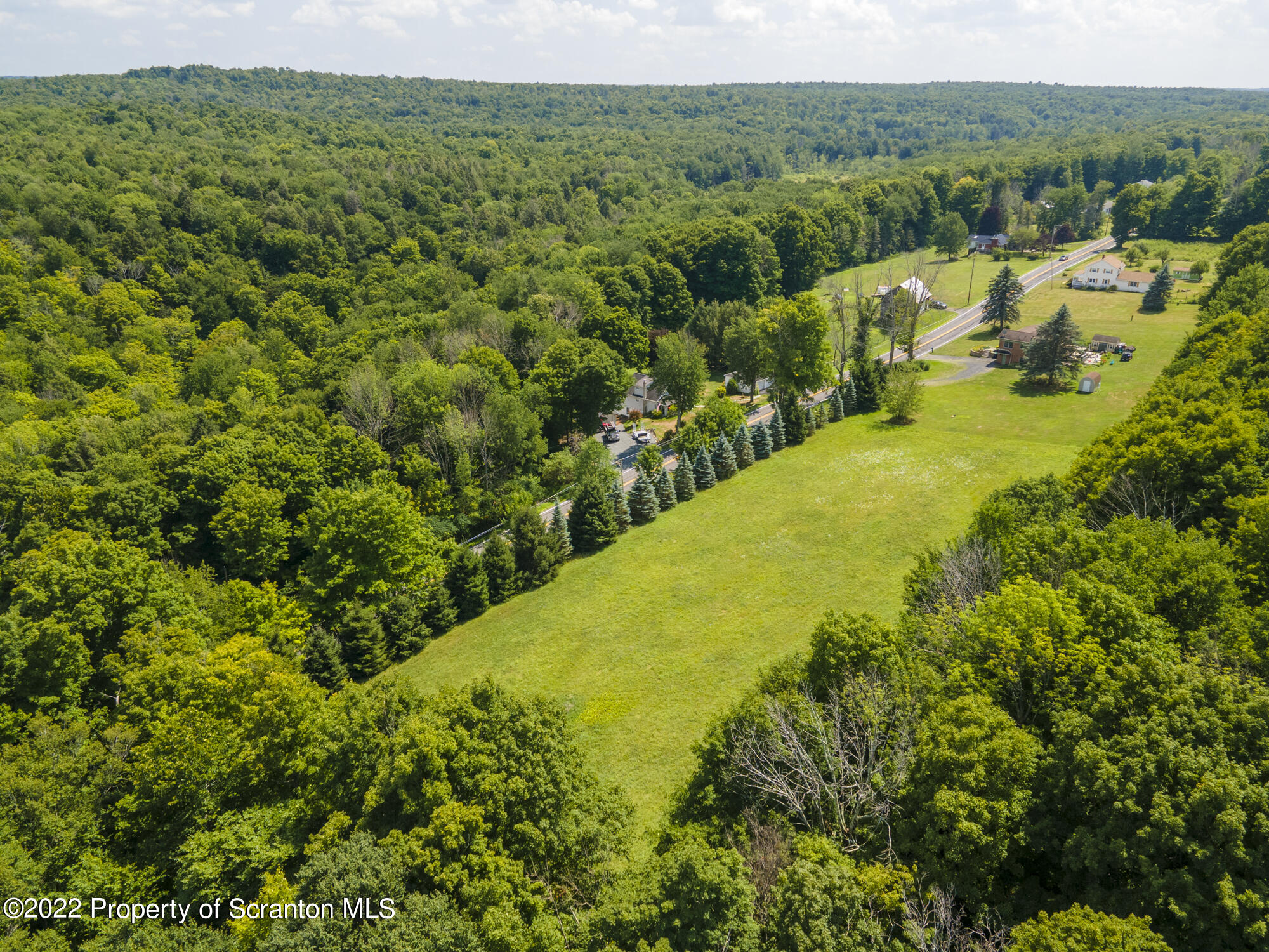 Lot 1 Jubilee Road Moscow, PA 18444 - Photo 10 of 11 a view of a lake with a yard