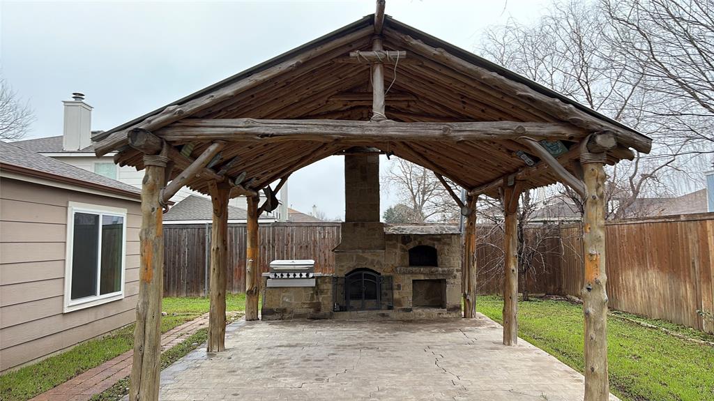 1005 Greenbend Drive Denton, TX 76210 - Photo 1 of 1 a front view of a house with garden