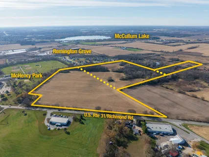 an aerial view of residential building and ocean