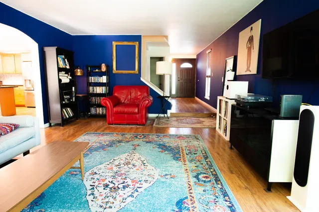 a kitchen with stainless steel appliances granite countertop a refrigerator and stove