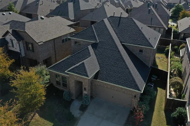 a terrace of a house with wooden fence