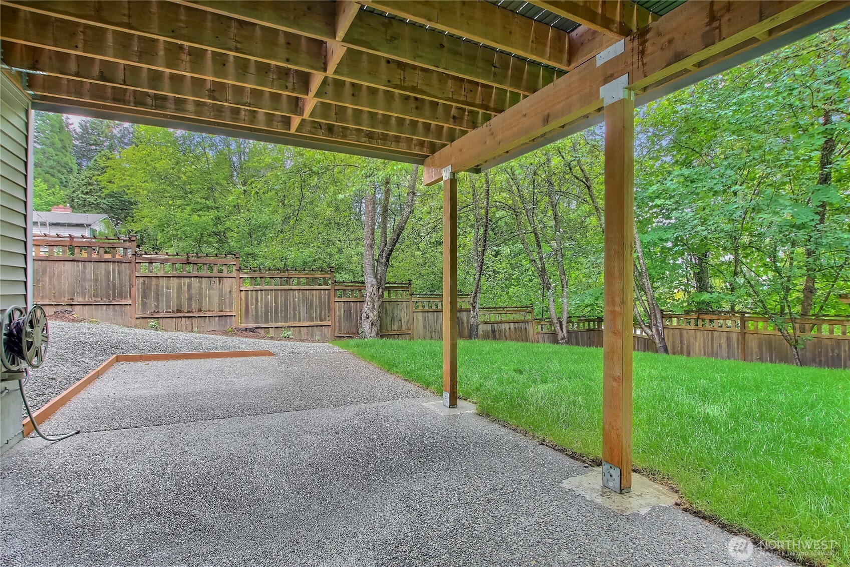 9430 Northeast 181st Lane Bothell, WA 98011 - Photo 13 of 25 a view of a backyard with table and chairs