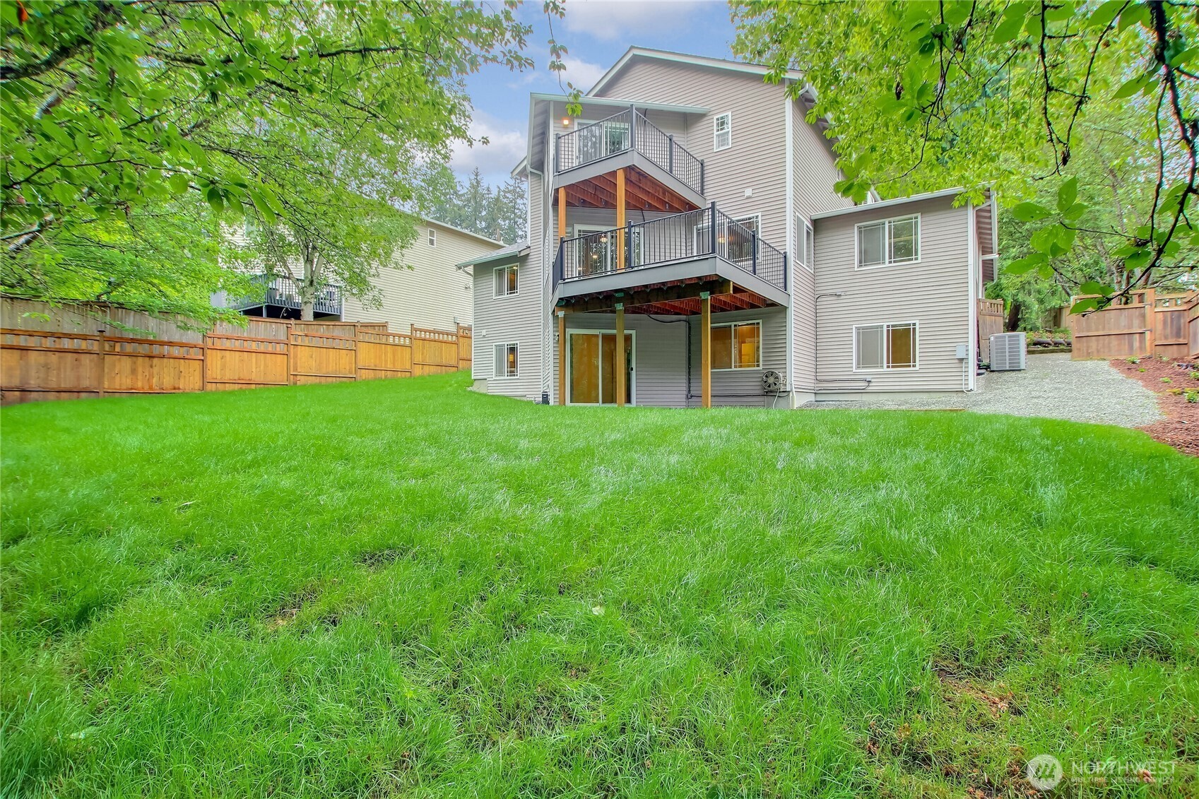 9430 Northeast 181st Lane Bothell, WA 98011 - Photo 15 of 25 a view of a house with a yard and sitting area