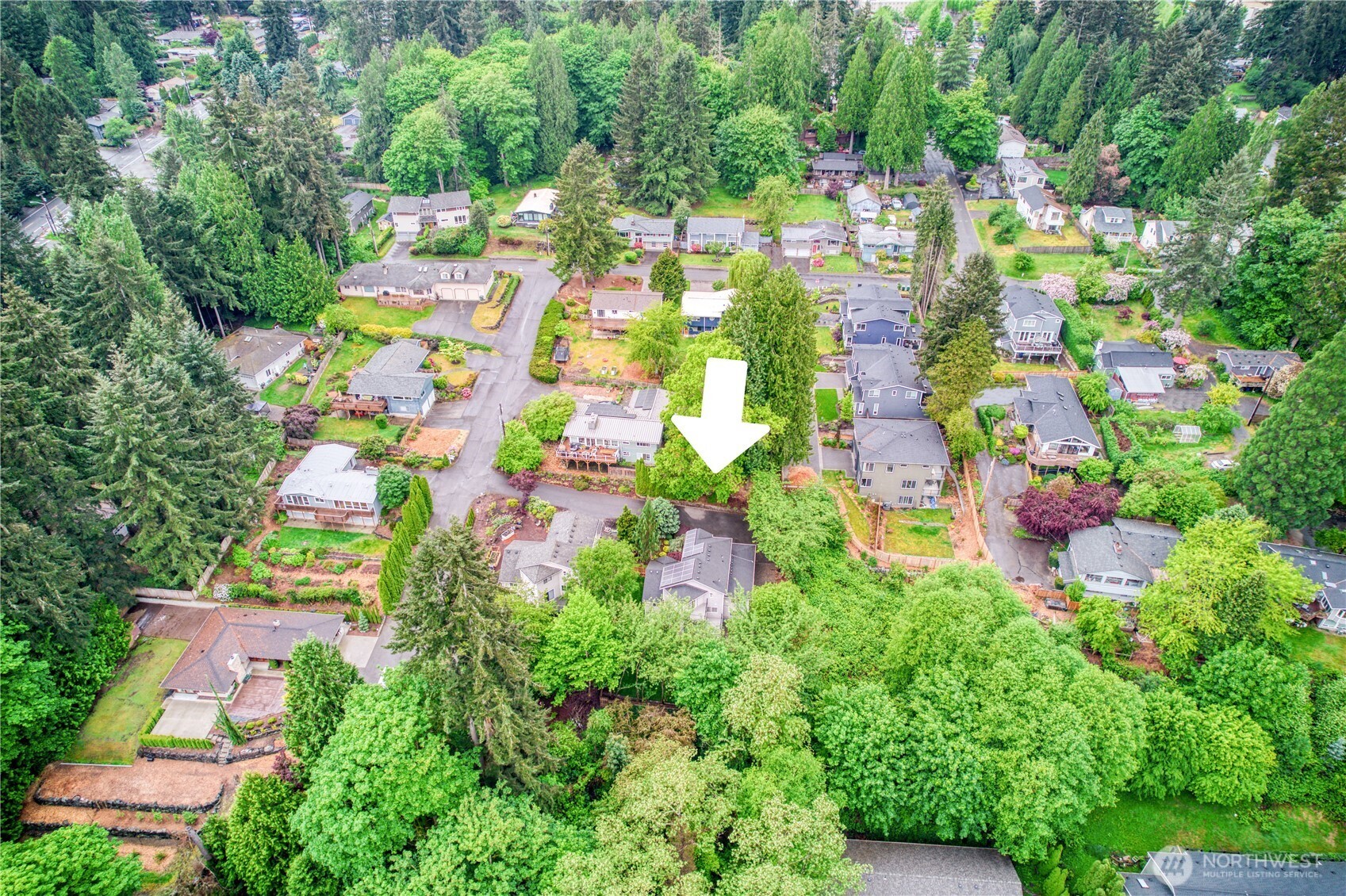 9430 Northeast 181st Lane Bothell, WA 98011 - Photo 24 of 25 an aerial view of residential houses with outdoor space and trees all around