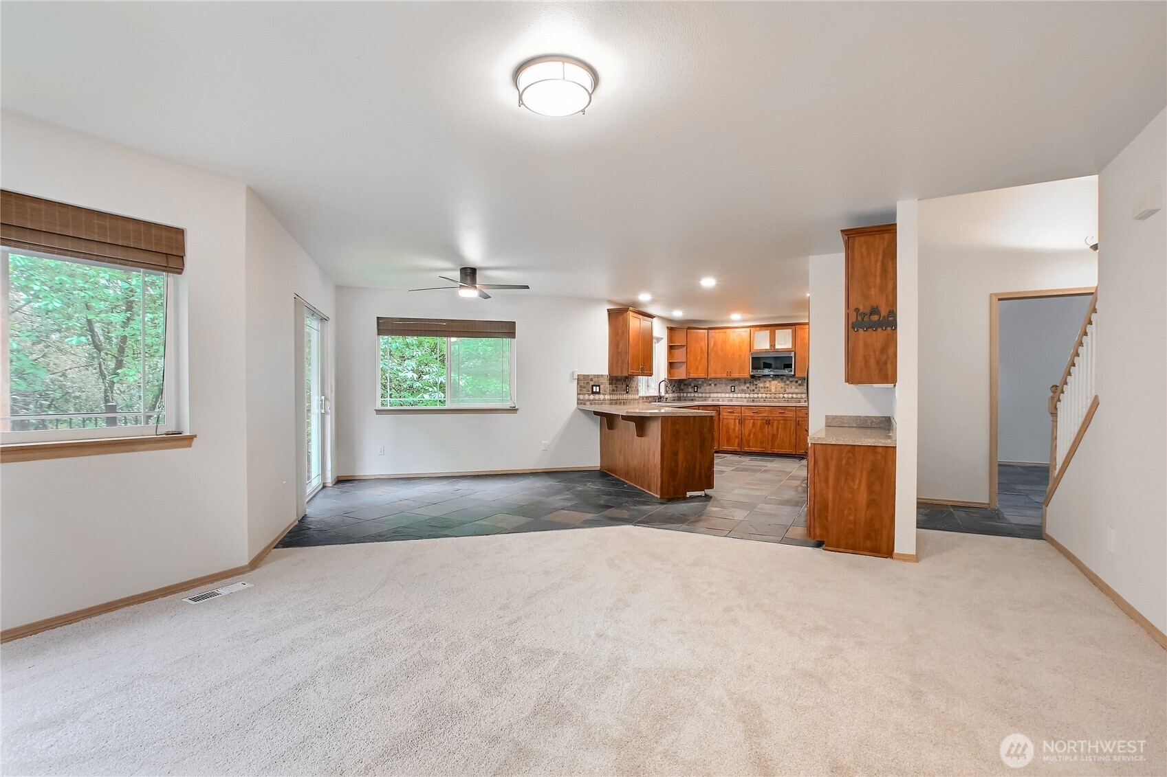 9430 Northeast 181st Lane Bothell, WA 98011 - Photo 4 of 25 a view of a kitchen with a sink and a window