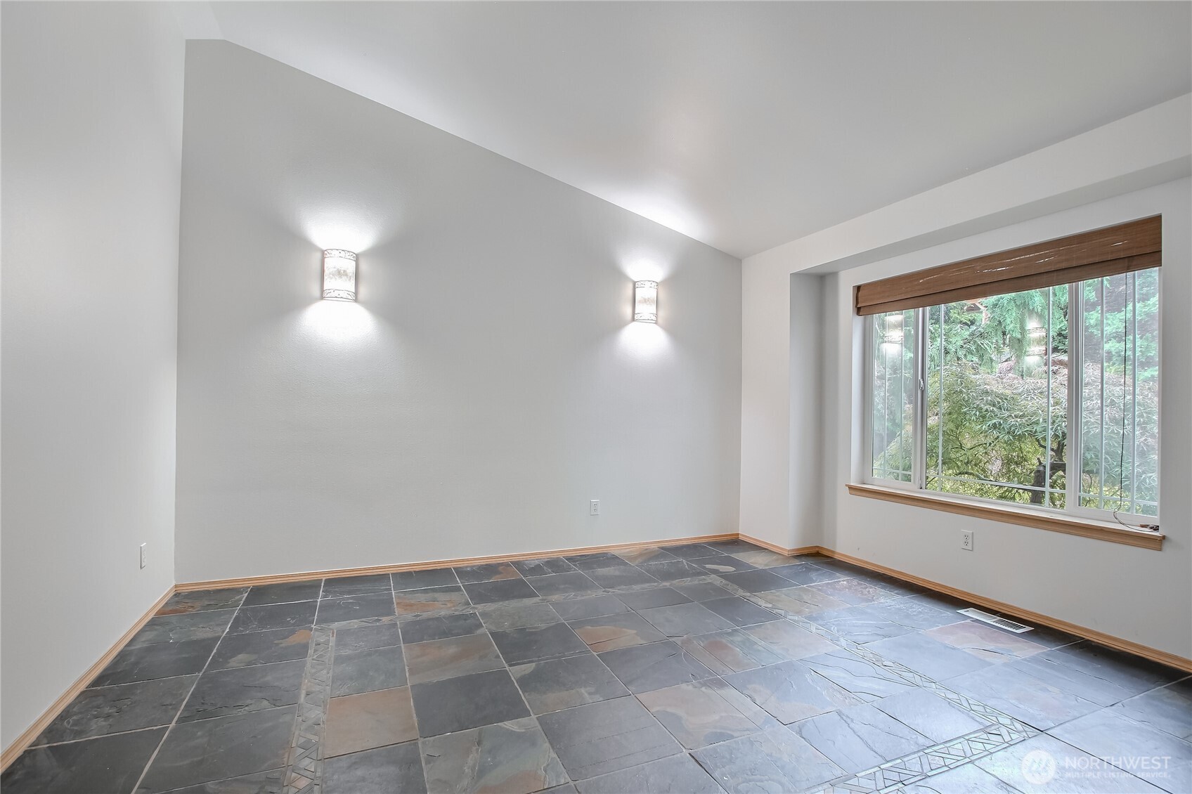 9430 Northeast 181st Lane Bothell, WA 98011 - Photo 7 of 25 a view of an empty room with a window