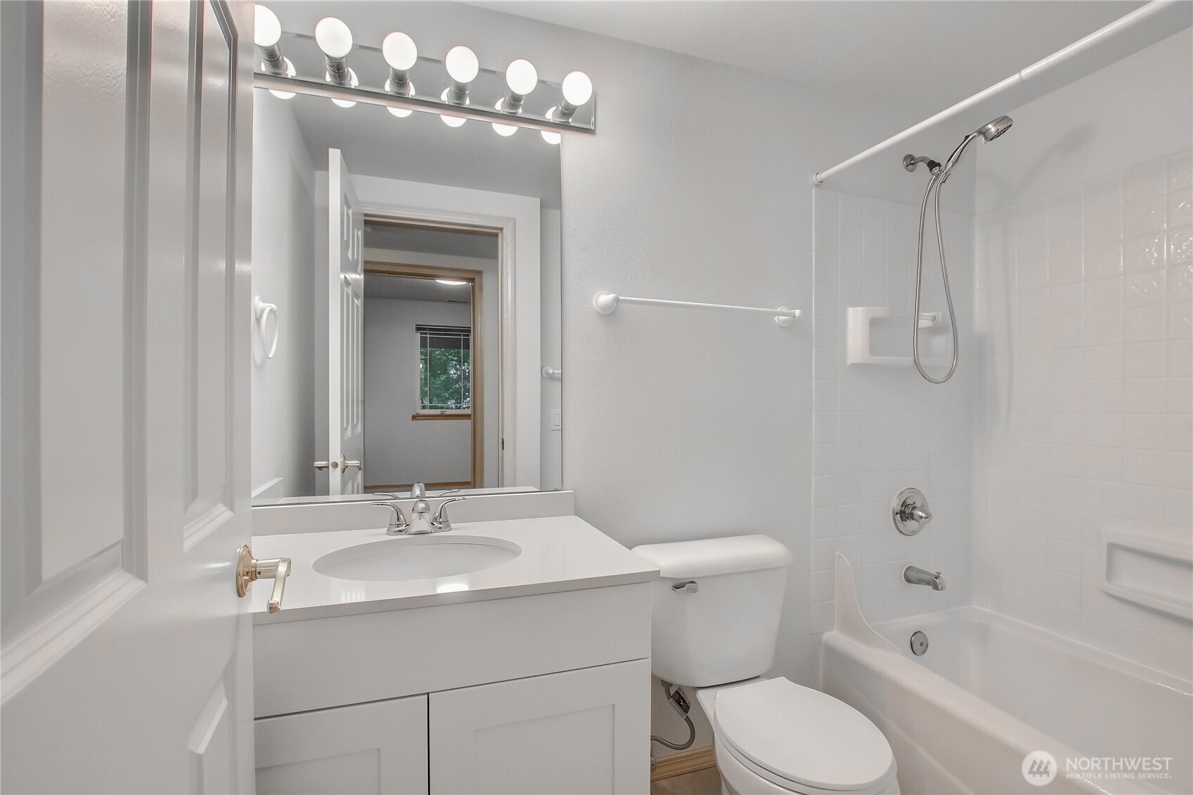 9430 Northeast 181st Lane Bothell, WA 98011 - Photo 8 of 25 a bathroom with a granite countertop sink a toilet and shower