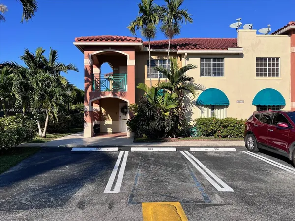 a view of a street with cars