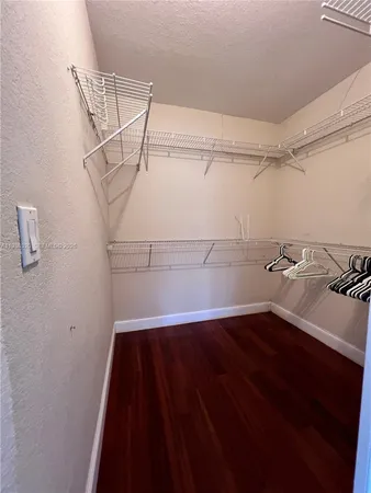 a view of a room with racks on the wall