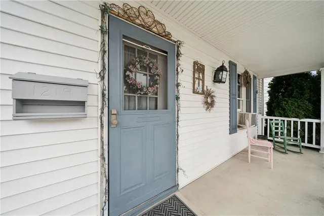 a view of a porch with a bench
