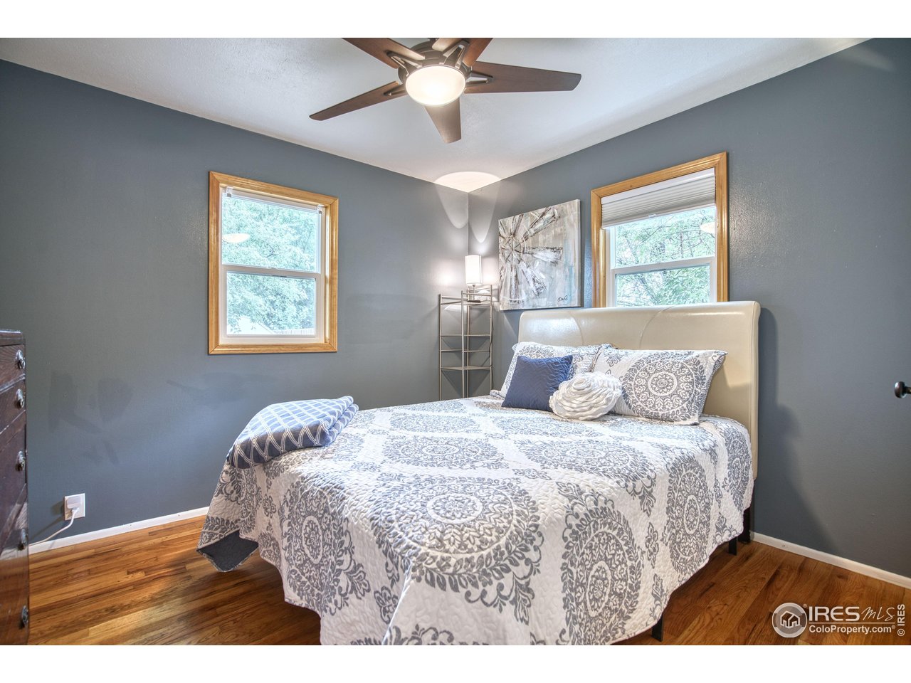 361 Delaware Street Sterling, CO 80751 - Photo 16 of 27 a bedroom with a bed and a window