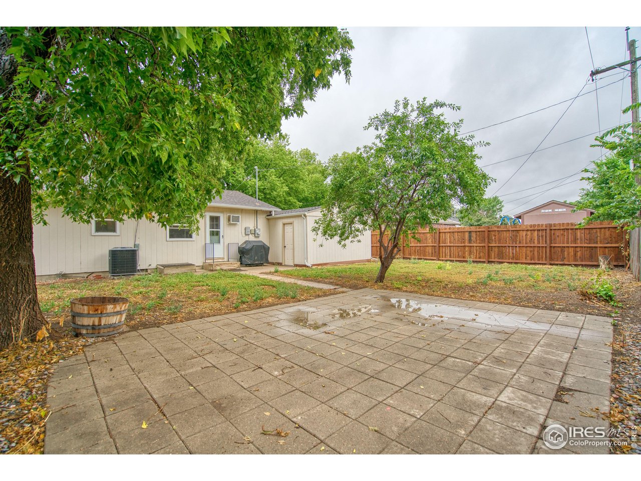 361 Delaware Street Sterling, CO 80751 - Photo 22 of 27 a view of a backyard of the house