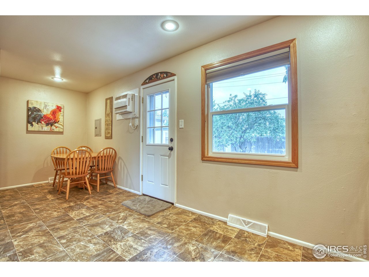 361 Delaware Street Sterling, CO 80751 - Photo 9 of 27 a room with furniture and a window