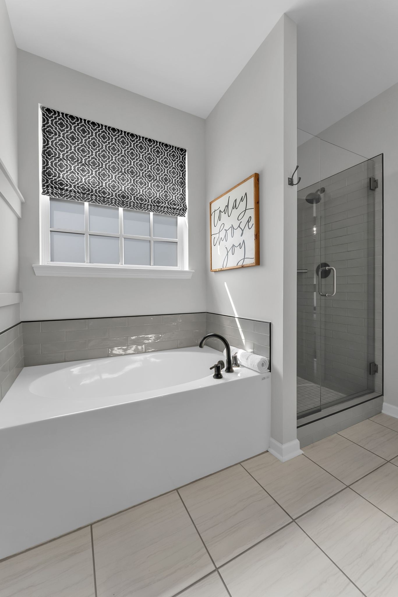 2083 Tollgate Boulevard Thompson's Station, TN 37179 - Photo 30 of 40 a spacious bathroom with a bathtub and a shower