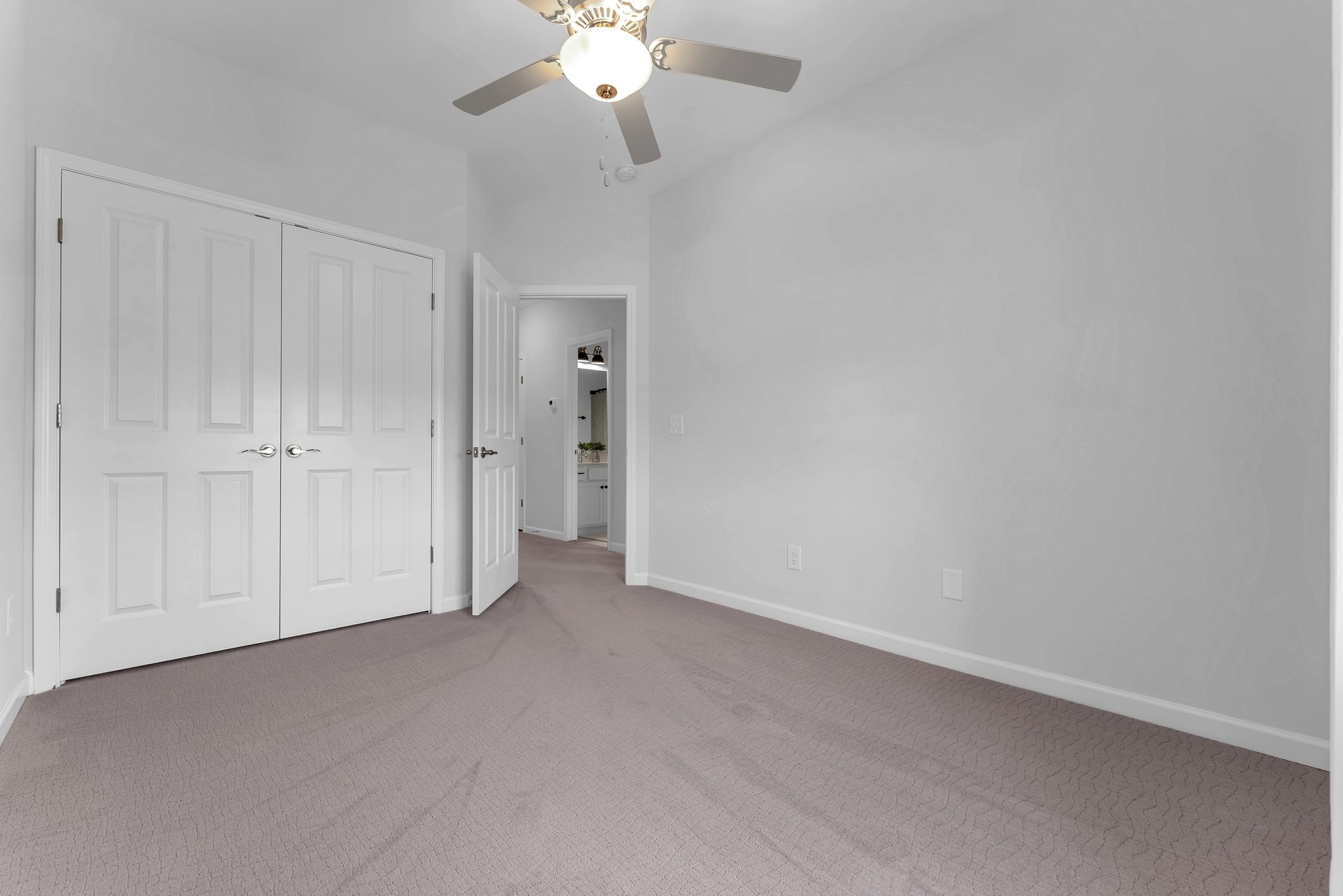 2083 Tollgate Boulevard Thompson's Station, TN 37179 - Photo 34 of 40 an empty room with chandelier fan