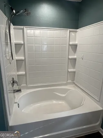 a bathroom with a bathtub