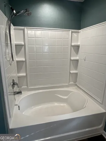 a bathroom with a bathtub