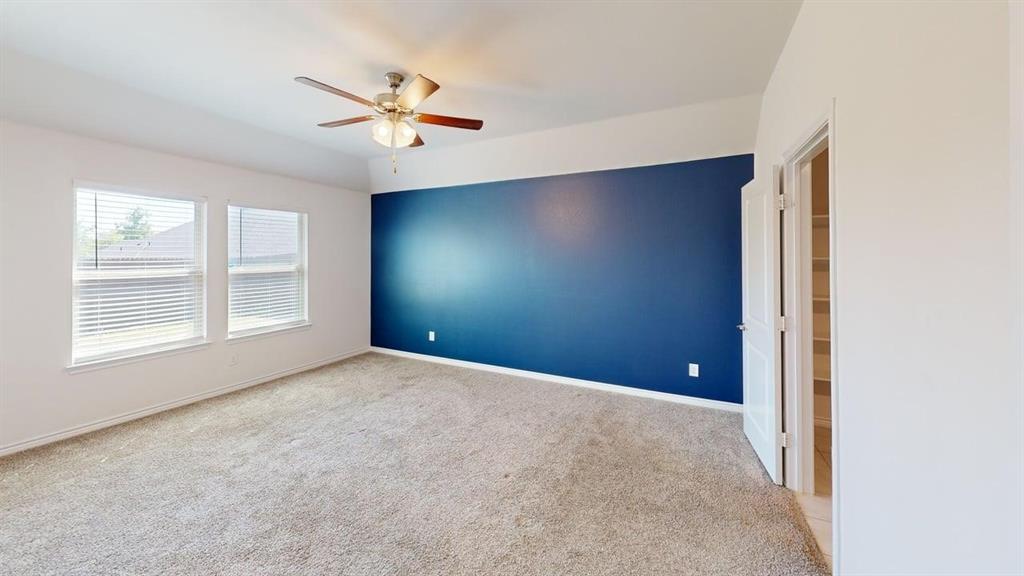 405 Rawhide Way Princeton, TX 75407 - Photo 10 of 22 a view of an empty room with a window