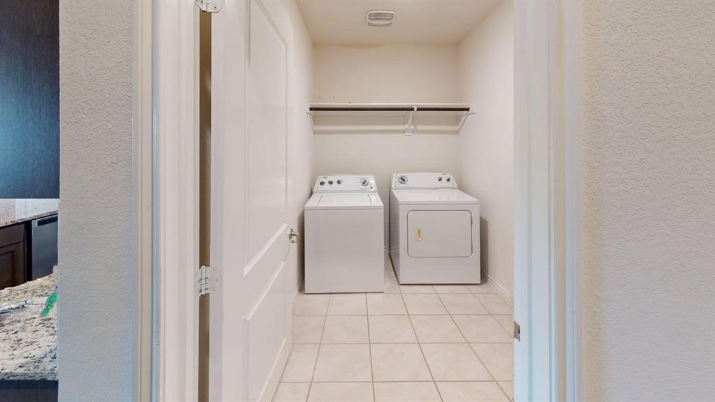 405 Rawhide Way Princeton, TX 75407 - Photo 17 of 22 a utility room with dryer and washer