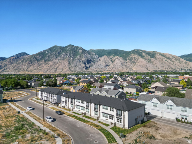 717 South Harrison Drive West Springville, UT 84663 - Photo 26 of 31 Contemporary multi-level townhome with light gray siding and contrasting dark trim