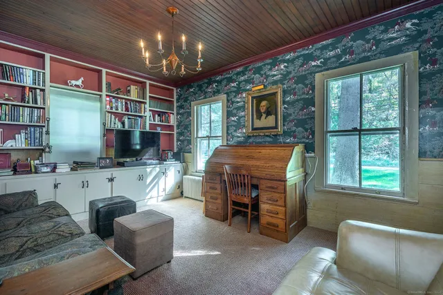 a living room with furniture and a window